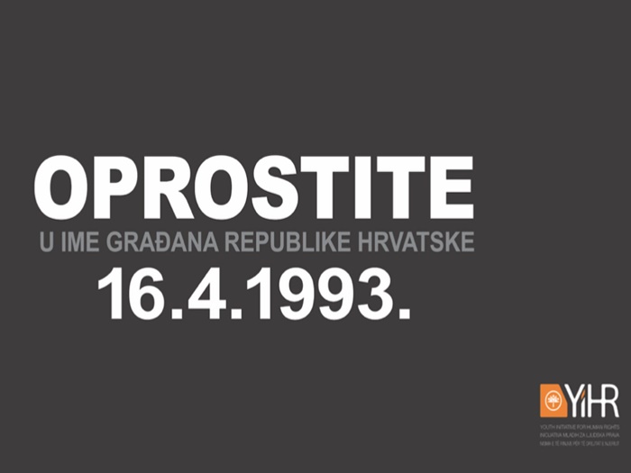 Plakat sa porukom 'Oprostite u ime građana Hrvatske' na ulazu u Ahmiće